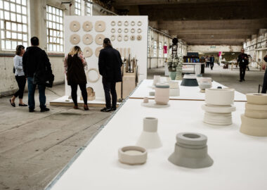 Delicately turned ceramics in pastel shades are displayed on tables in the Spode China Hall as part of British Ceramics Biennial 2019 festival.