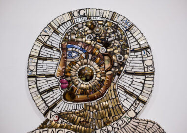 Close up of Mosaic face on a piece made by Cleo Mussi, AWARD Exhibitor at British Ceramics Biennial 2021