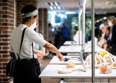 Visitors in the Kasama Exchange exhibit at British Ceramics Biennial 2021