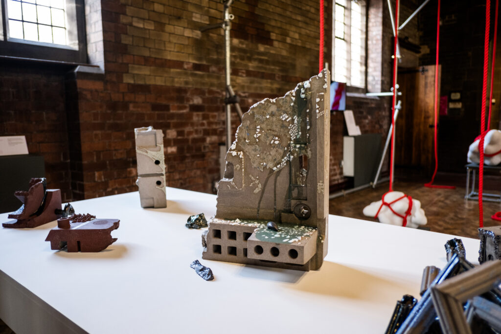 A tower-like slab-built piece as part of Rebecca Griffiths work in the 2023 British Ceramics Biennial.