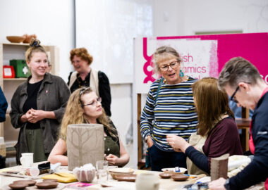 Studio members talk to visitors at the BCB Studio opening event.