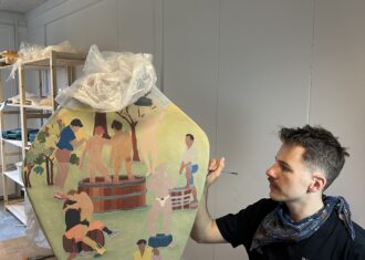 Krzysztof Strzelecki paints a large vessel with a variety of male figures during his Fresh Talent Residency.